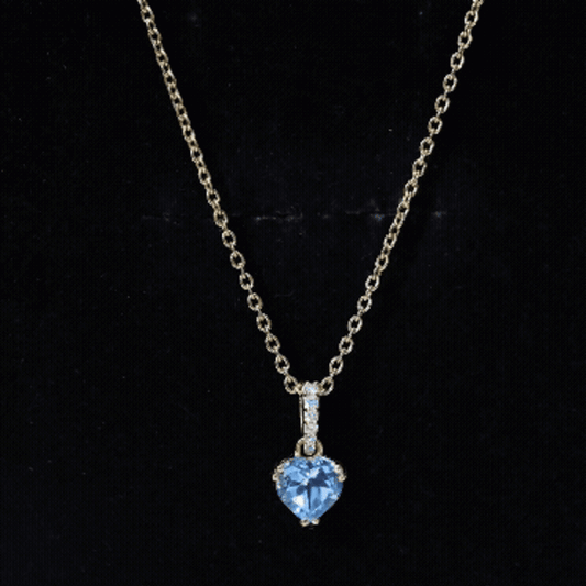 0.9 Carat Swiss Blue Topaz Solitaire And Diamond Heart Necklace With Chain