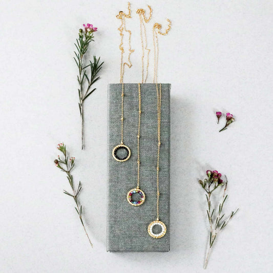 Black Spinel pendant with rainbow gemstones and pearl on gold plated silver chain