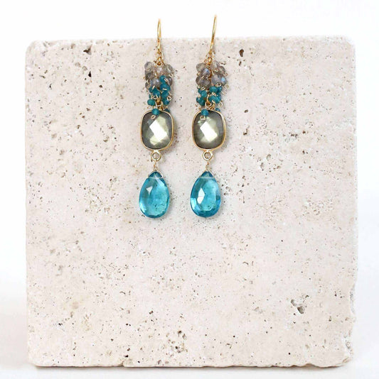 Labradorite Bezel Cluster EarringsDripping in gems, these long gemstone drop earrings are made with a labradorite bezel and neon blue quartz gemstones.- 2.5" long- French hooks
- 14k gold plated fineEarringsPARKEN JEWELRYVettedArcLabradorite Bezel Cluster Earrings