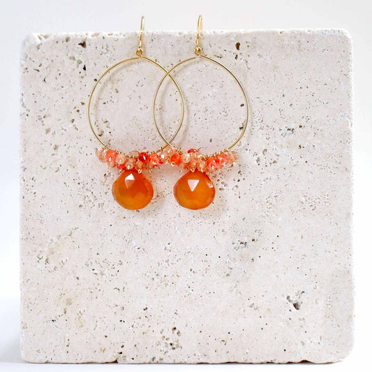 Dark Orange Chalcedony Swing EarringsOur Swing Earrings are almost weightless! So they're super easy-to-wear.- Dark Orange Chalcedony gemstones- French hooks- 2.25" long- 14k gold plated .925 Italian siEarringsPARKEN JEWELRYVettedArcDark Orange Chalcedony