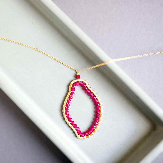 Ruby Quartz Freestyle Jewelry SetCompletely one-of-a-kind, Ruby Quartz gold pendant and earrings set. Each one is a unique, amorphous shape.
Floating pendant is strung on a very delicate chain that Necklace/Earring KitPARKEN JEWELRYVettedArcRuby Quartz
