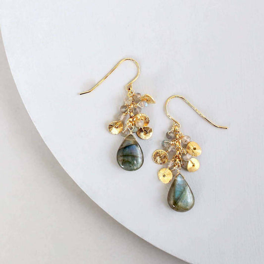 Labradorite Aurora EarringsBeautiful small gold earrings made with teardrop shaped labradorite gemstones and a cluster of gold and labradorite gemstone accents.
- 1.5" long- French hooks
- 14kEarringsPARKEN JEWELRYVettedArcLabradorite Aurora Earrings