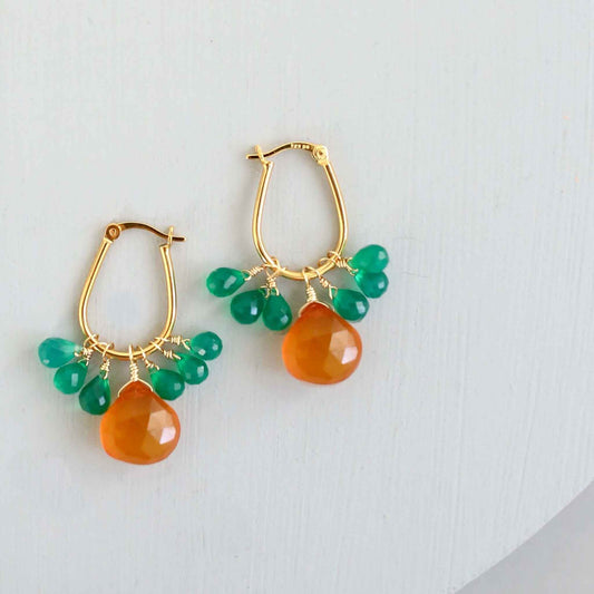 Dark Orange Chalcedony & Green Onyx Gold EarringsSmall but mighty rich color. Beautiful dark orange chalcedony paired with green onyx briolettes.
- 1.5 inches long- Latch backs- 14k gold plated .925 fine Italian stEarringsPARKEN JEWELRYVettedArcDark Orange Chalcedony