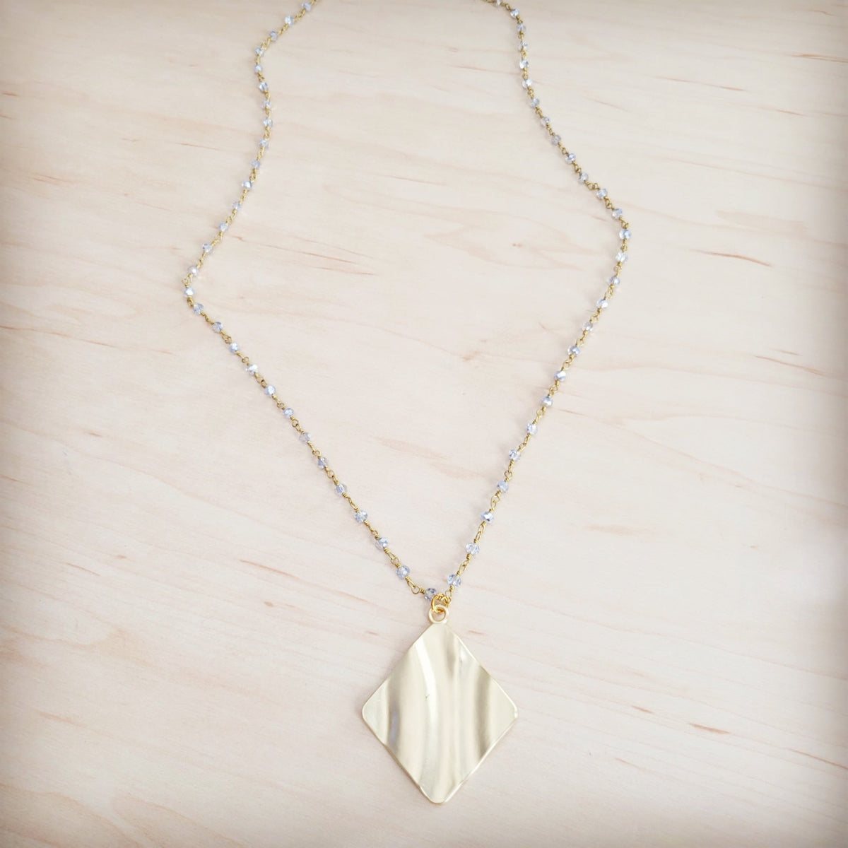 **Gilded Wave Pendant Necklace 257mb