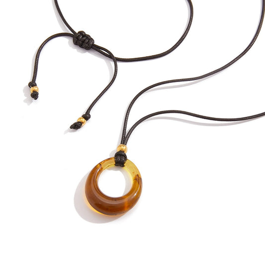 Amber-colored Resin Long Necklace With A Black Cord