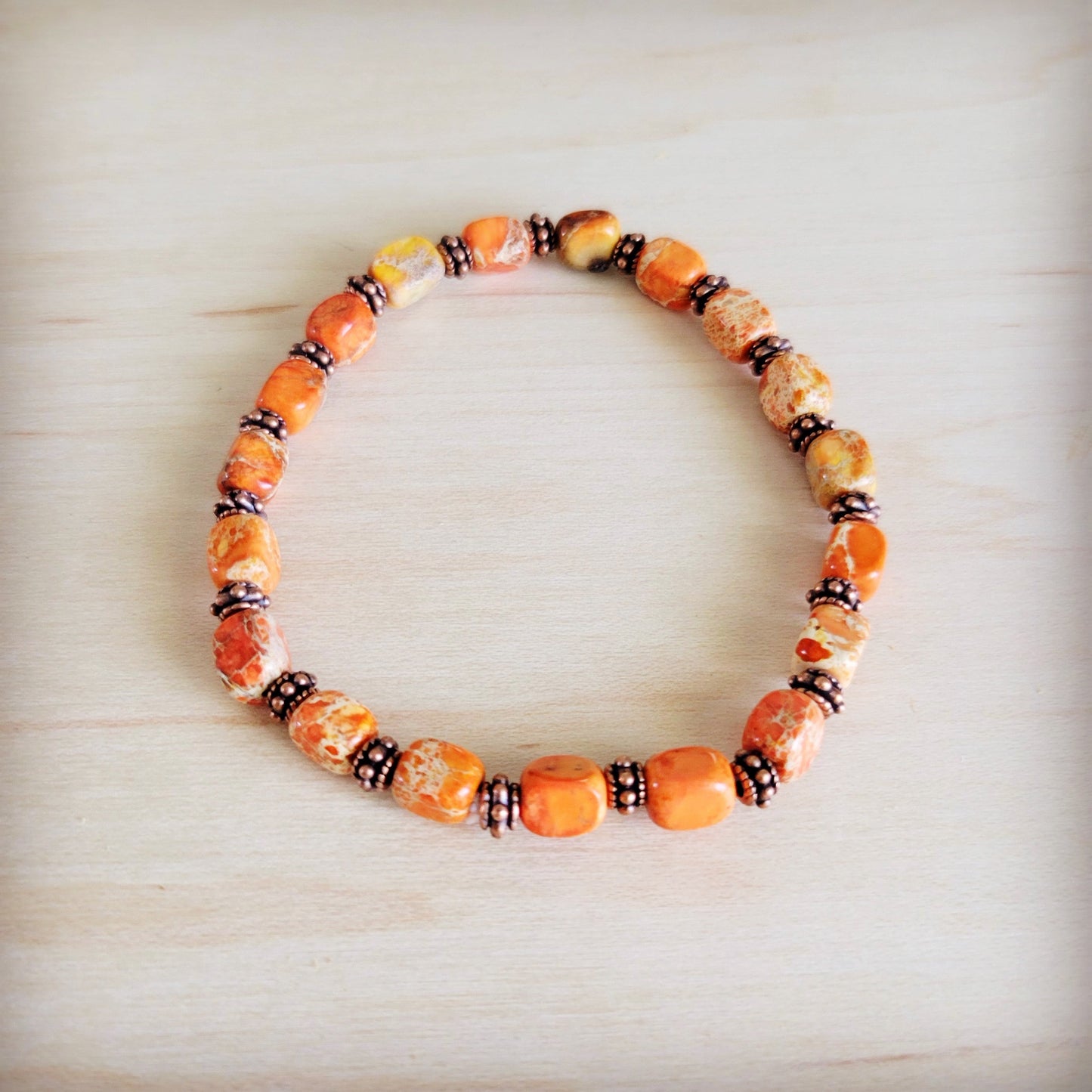 Genuine Regalite and Copper Stretch Beaded Bracelet Orange 812i