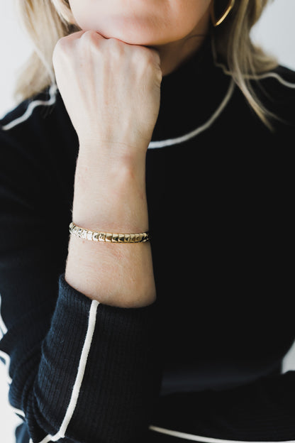 A EMBOSSED CUFF