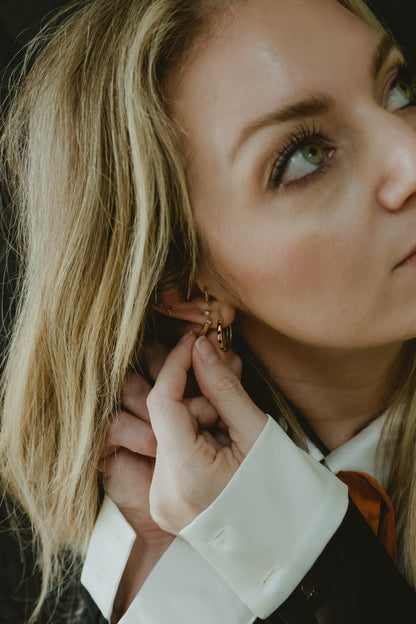 THE A'S (HUGGIE EARRINGS)