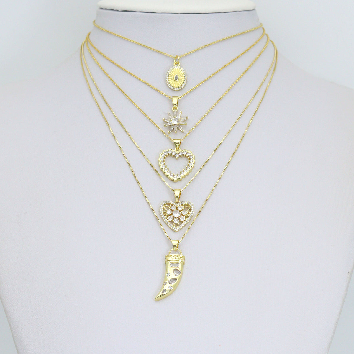 Gold Charm Collections-Oval Medallion, heart, Horn and Starburst, Sku#LX955