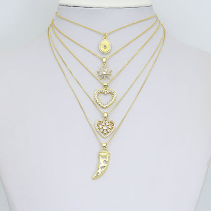 Gold Charm Collections-Oval Medallion, heart, Horn and Starburst, Sku#LX955