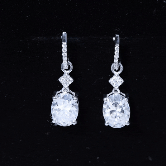 Oval Cut Lab Grown Diamond Dangling Earrings For Bride