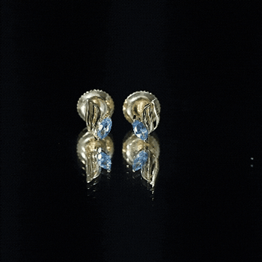 Natural Swiss Blue Topaz Leaf Earrings In Silver