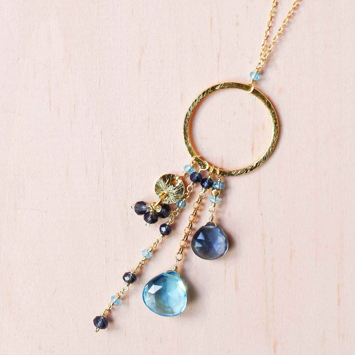 Aquamarine and Iolite Ammil Necklace with multi-strand gemstones and gold hoop clasp