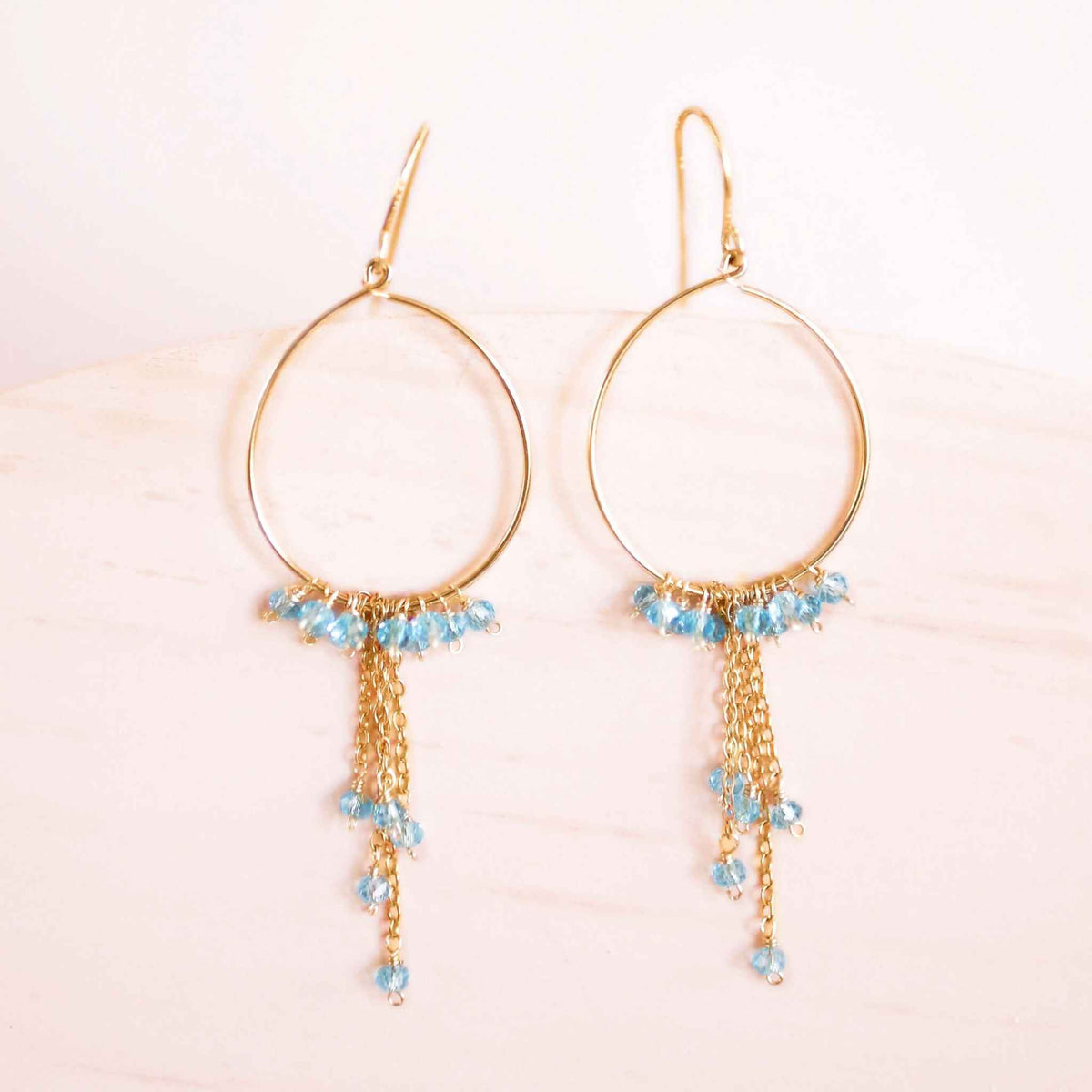 Aquamarine mini swing hoop earrings with delicate gemstone chains on gold plated sterling silver hoops
