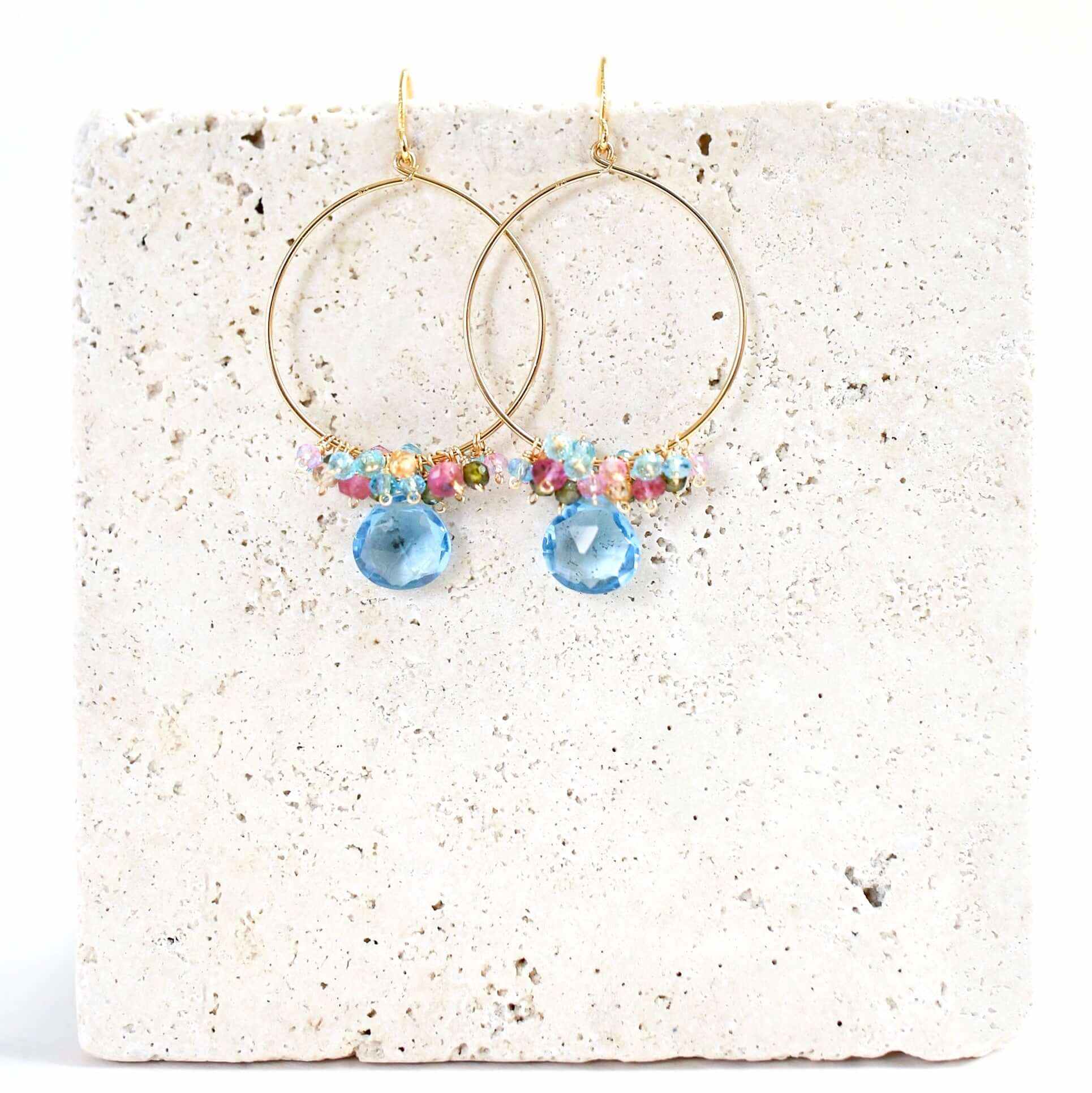 Aquamarine quartz swing earrings in 14k gold vermeil with delicate blue gemstones and French hooks