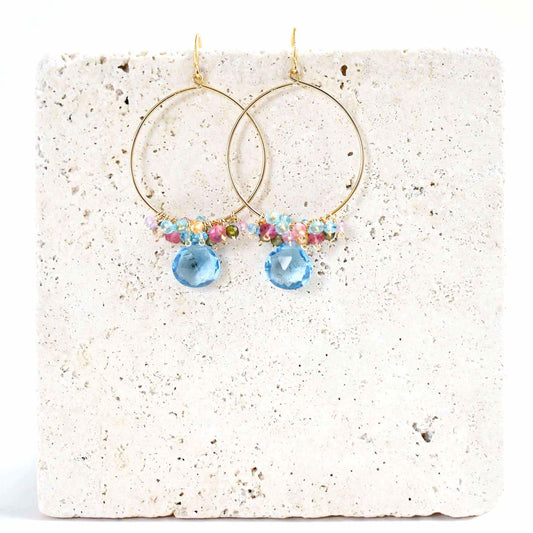 Aquamarine quartz swing earrings in 14k gold vermeil with delicate blue gemstones and French hooks