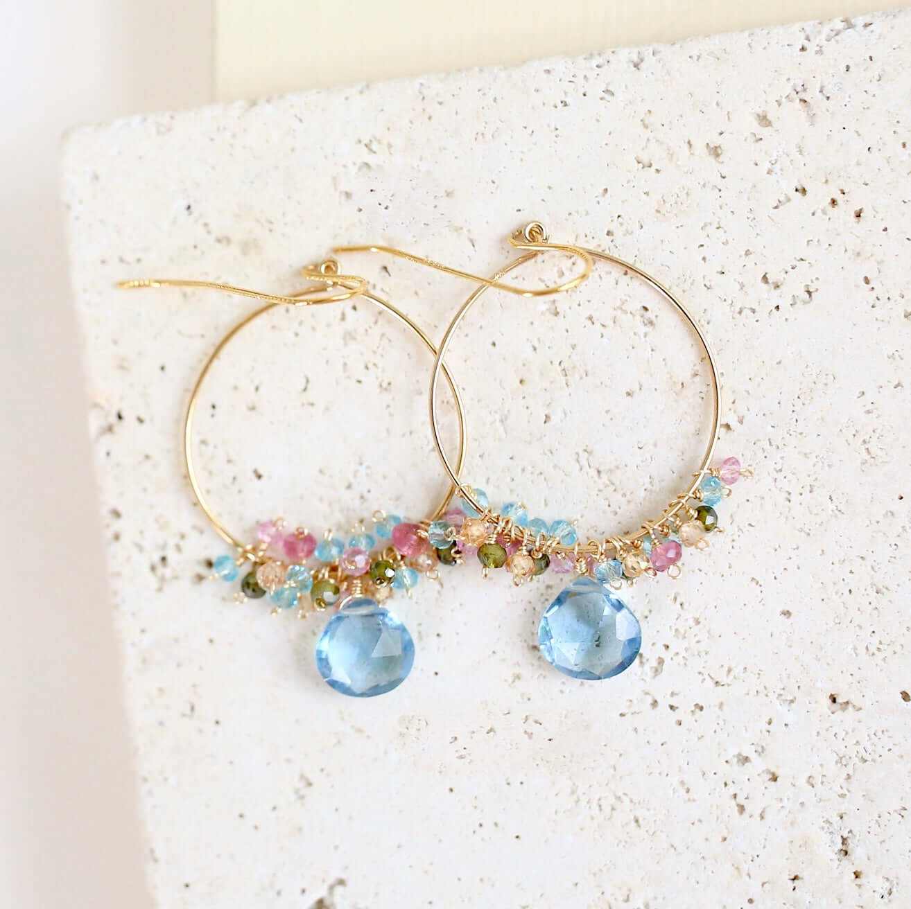 Aquamarine quartz swing earrings in gold vermeil with delicate motion and vibrant aqua blue gemstones
