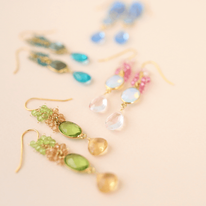 Bezel Cluster EarringsDripping in gems, these long gemstone drop earrings are a handmade combination of beautiful bezel set stones and clusters of gems.- 2.5" long- French hooks- 14k goldEarringsPARKEN JEWELRYVettedArcBezel Cluster Earrings