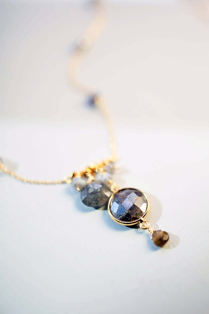 Gold bezel necklaces with labradorite and other gemstones on delicate chains