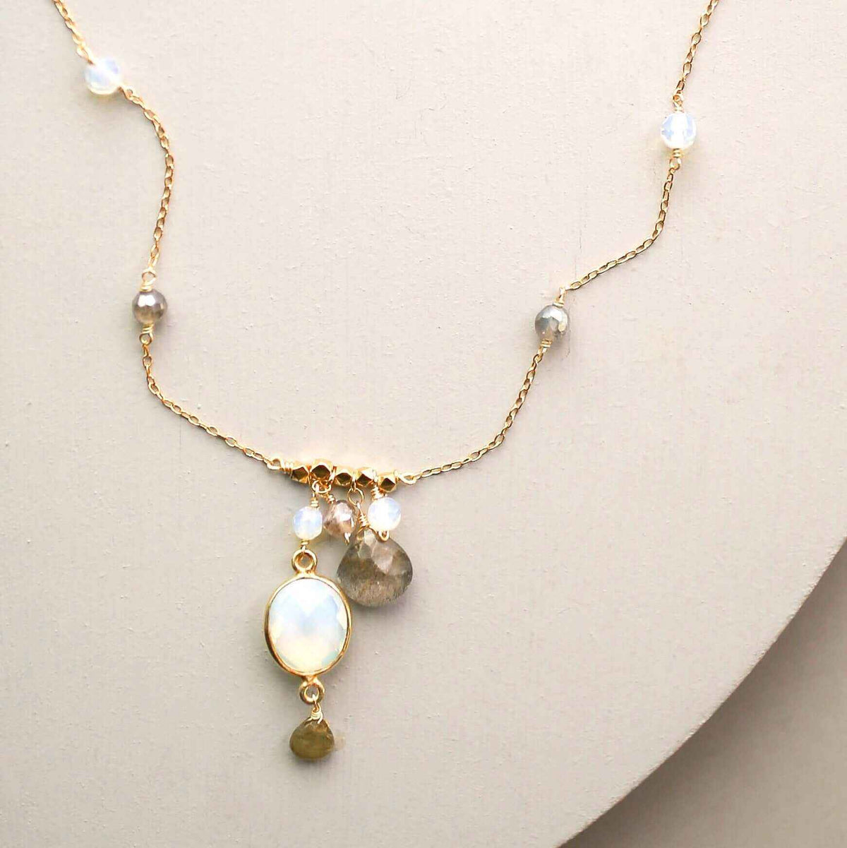 Delicate gold bezel necklaces with various gemstone pendants on fine Italian sterling silver chains