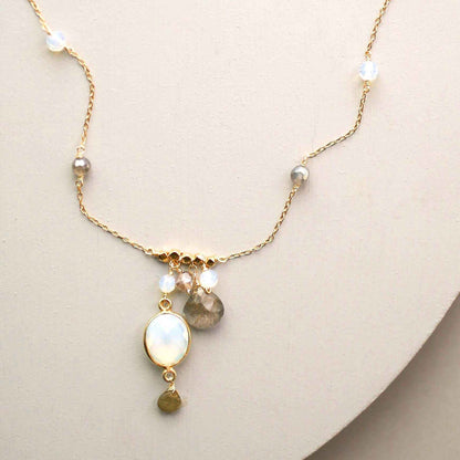 Delicate gold bezel necklaces with various gemstone pendants on fine Italian sterling silver chains