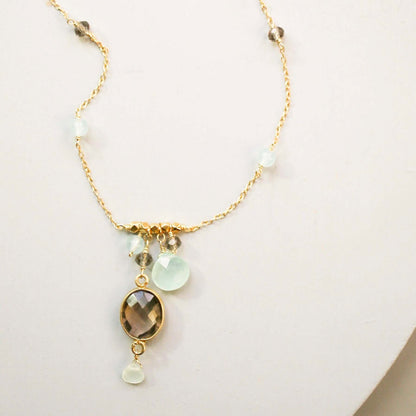Elegant bezel necklaces with bezel set gemstones on gold chains