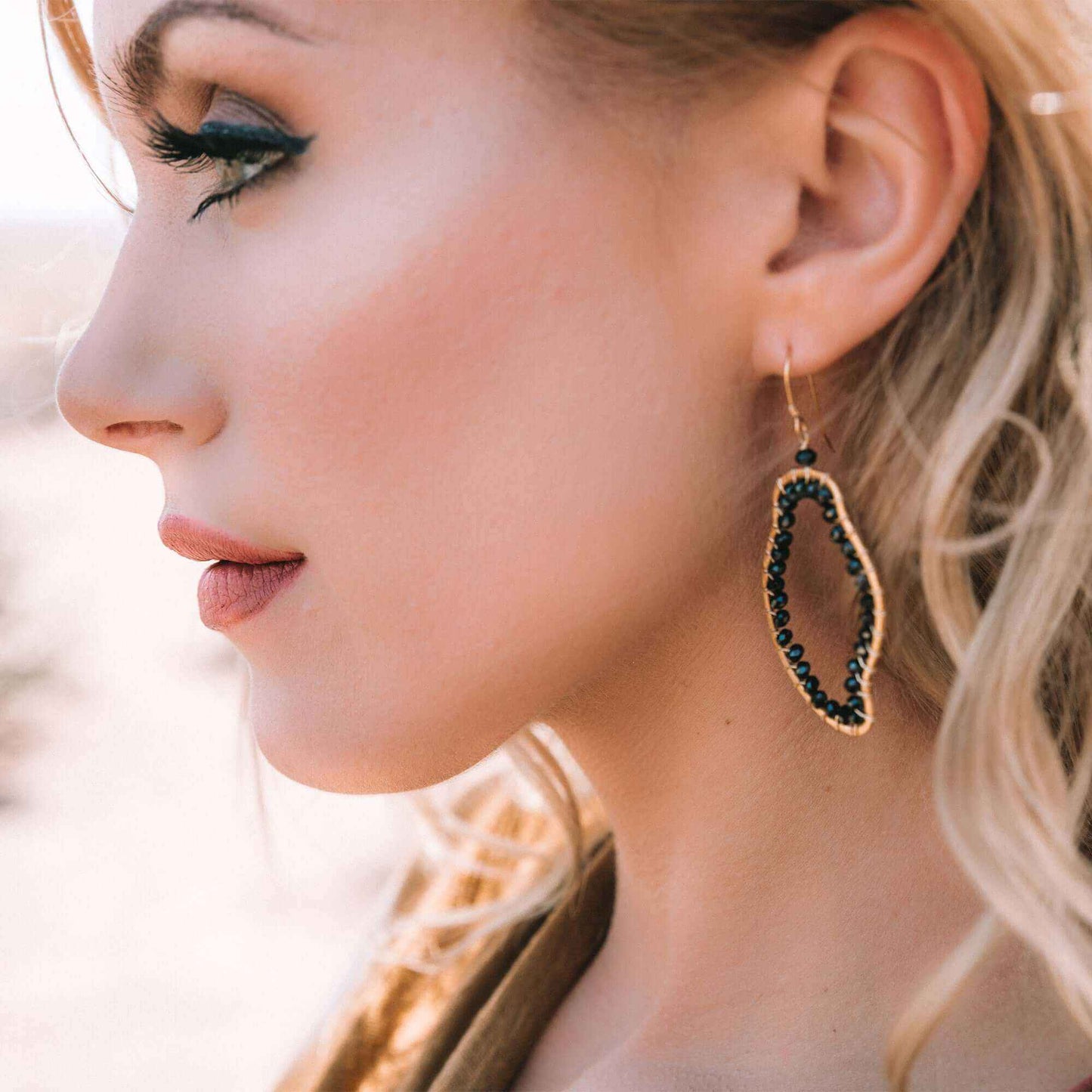 Black spinel freestyle earrings with abstract shapes, 14k gold plated sterling silver, French hooks, 2.5 inches long, handmade in NYC