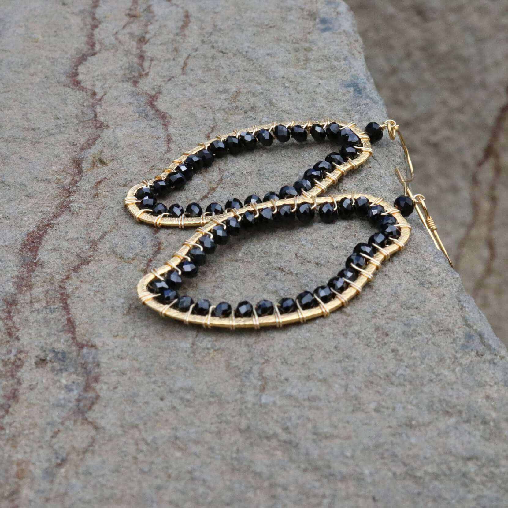 Black Spinel Freestyle Earrings made of 14k gold plated sterling silver with unique abstract shapes and French hooks