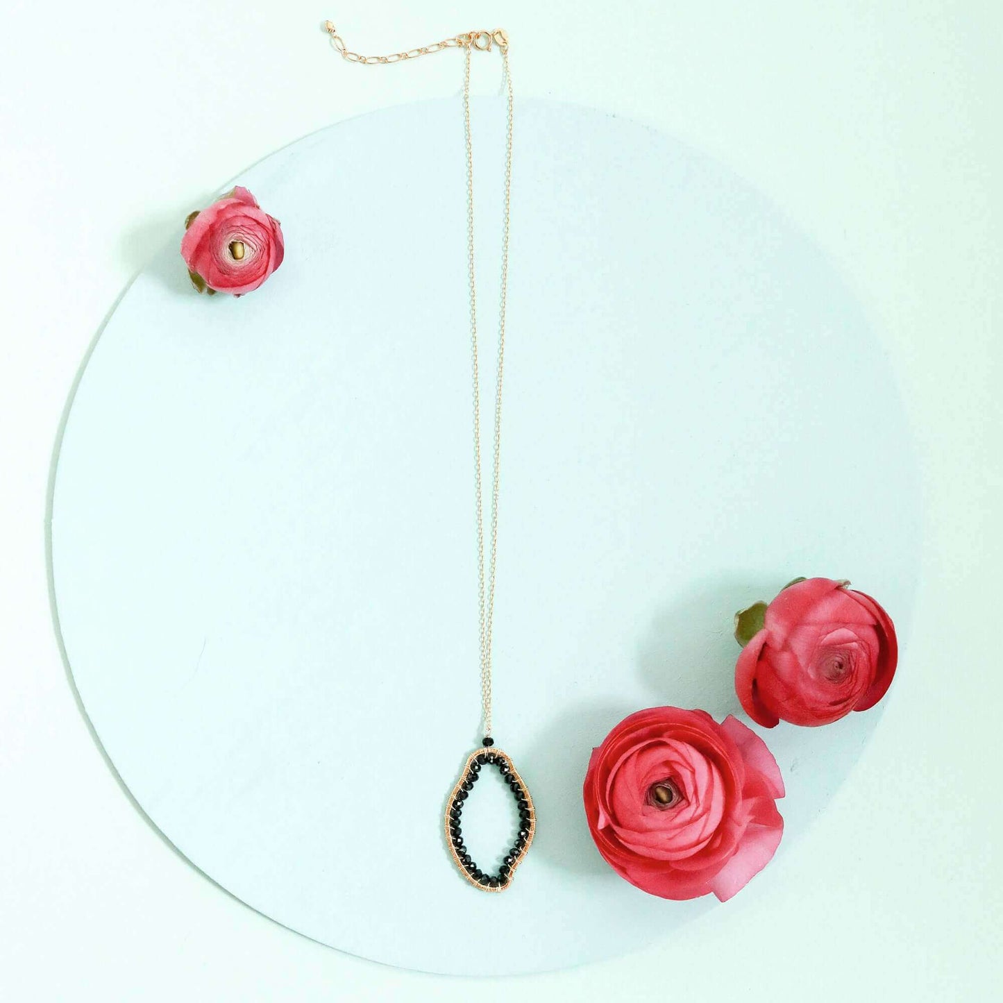 Black Spinel freestyle pendant necklace in 14k gold plated sterling silver on delicate adjustable chain