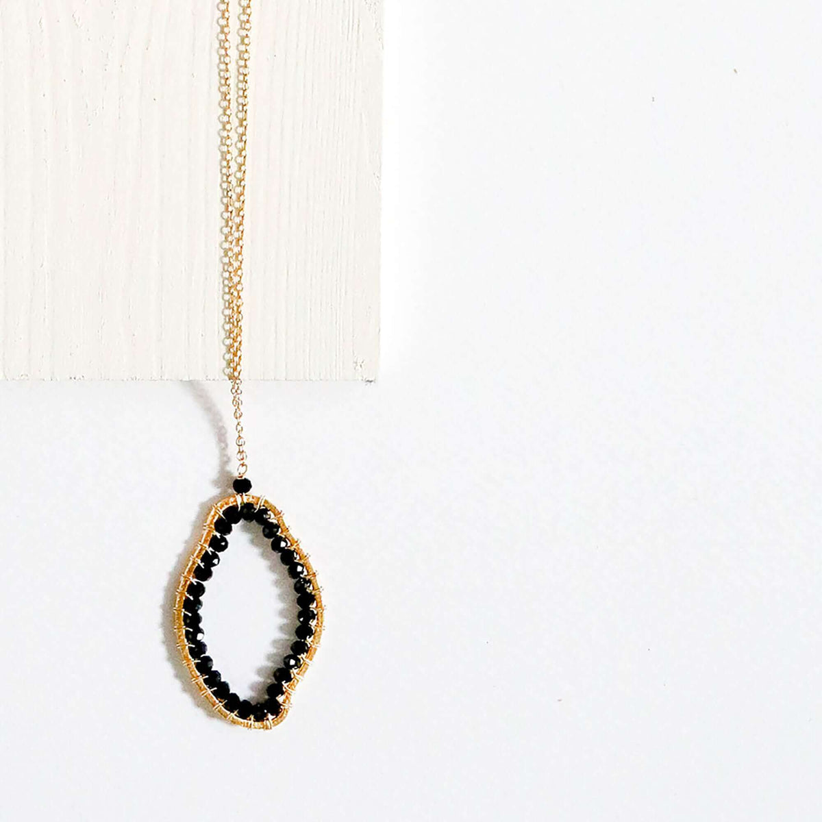 Black Spinel freestyle pendant necklace with delicate gold-plated sterling silver chain