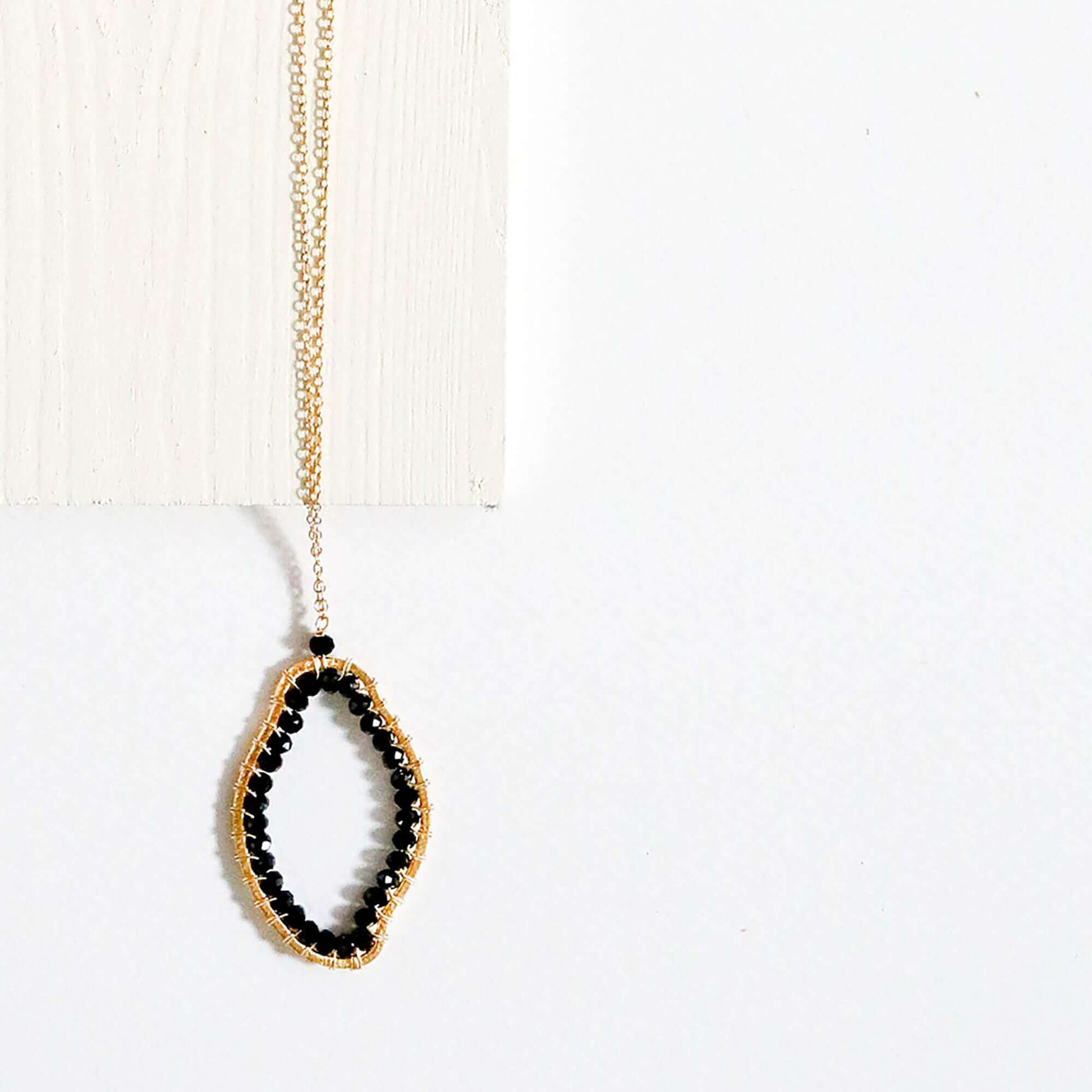Black Spinel freestyle pendant necklace with delicate gold-plated sterling silver chain