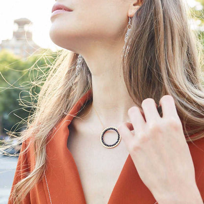Black Spinel Halo Necklace with 14k gold plated chain and floating pendant design
