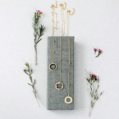 Black Spinel pendant with rainbow gemstones and pearl on gold plated silver chain