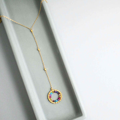 Black Spinel Y pendant necklace with rainbow gemstones and pearl halo on 14k gold plated sterling silver chain