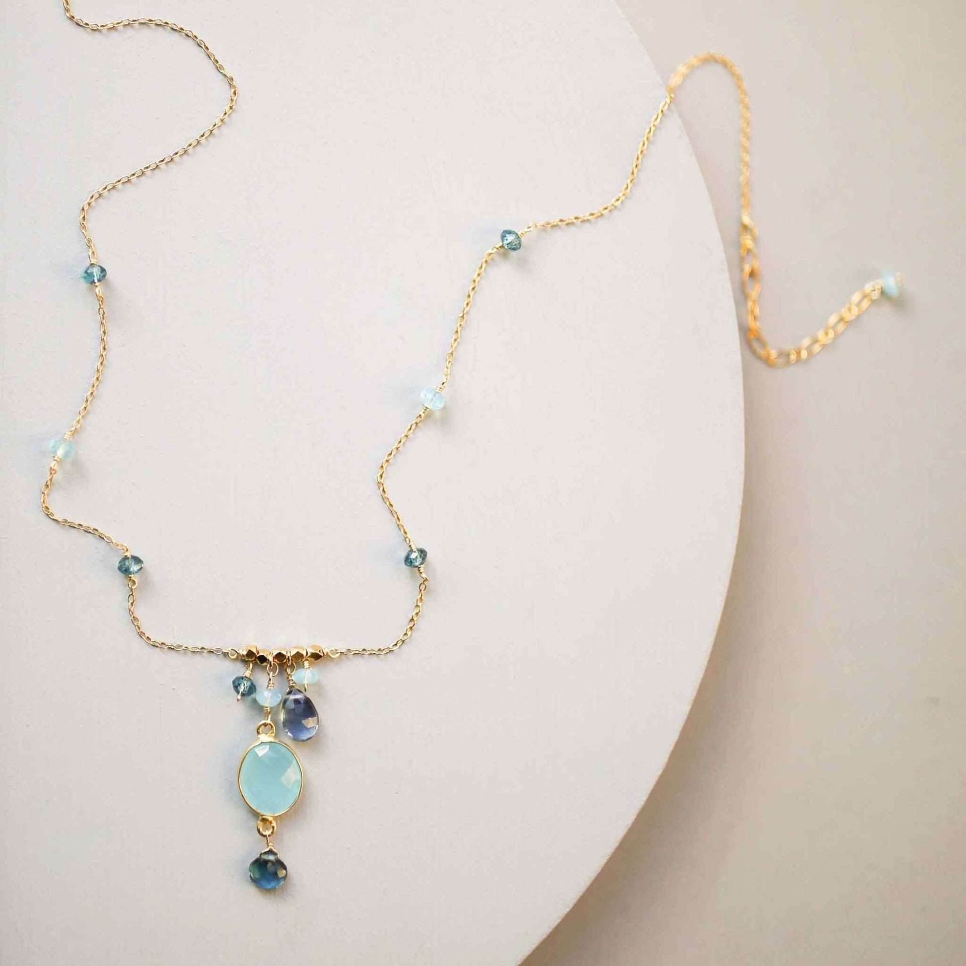 Blue chalcedony bezel necklace with gold chain and iolite accents, adjustable length, handmade in NYC