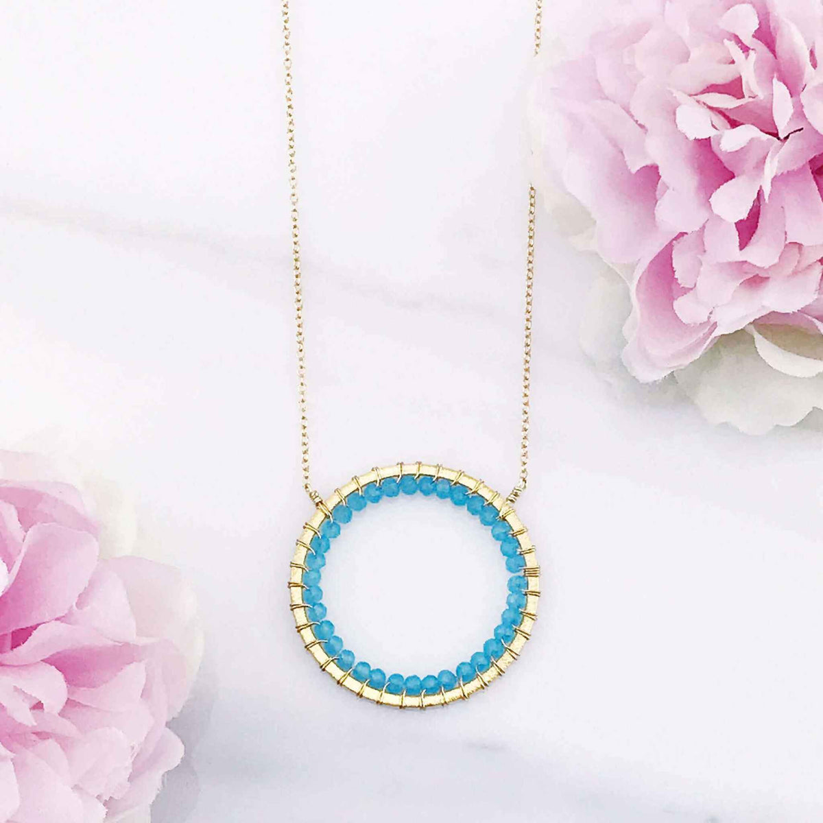 Blue Chalcedony Halo Necklace with 14k gold plated sterling silver chain and floating pendant design