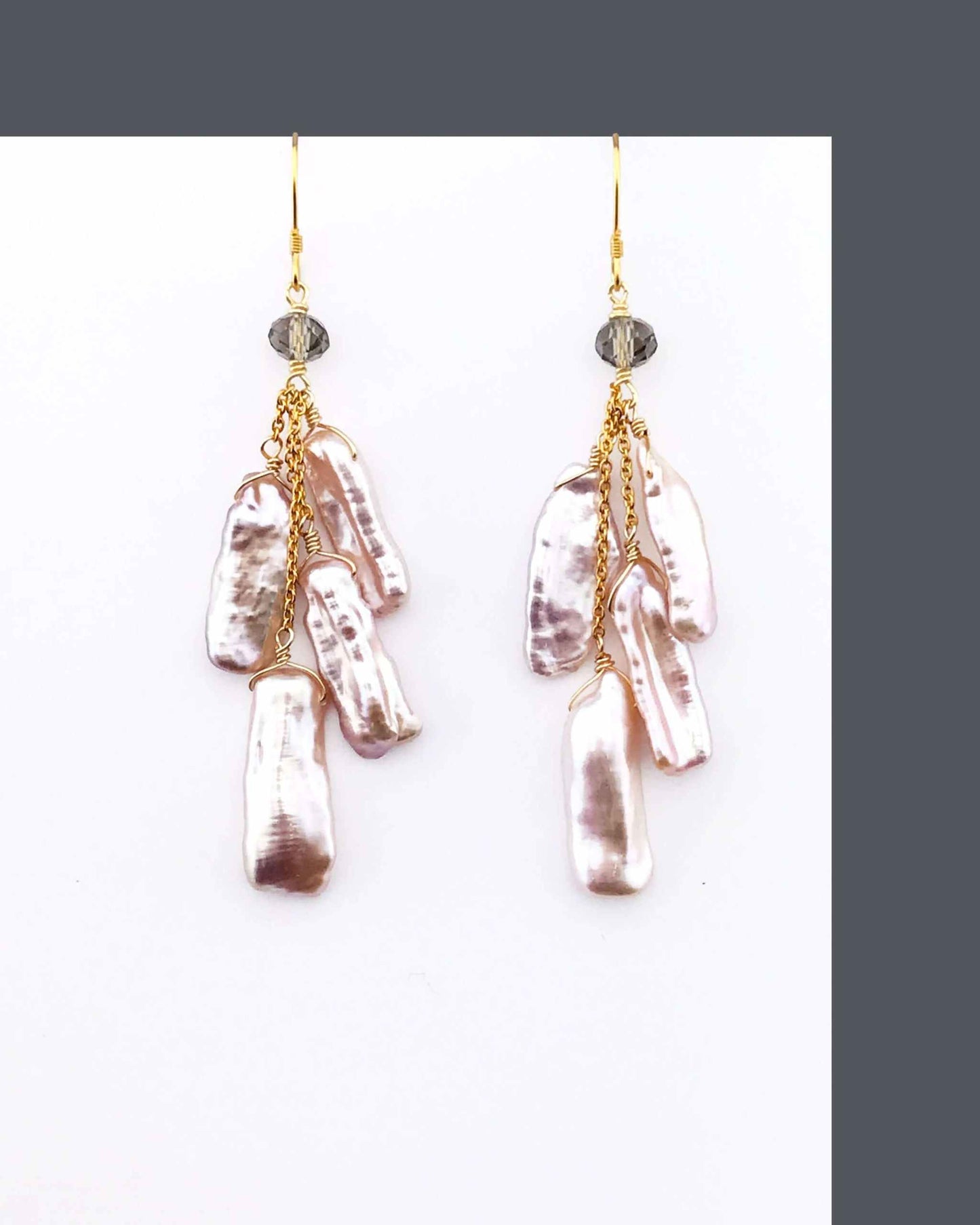 Blush stick pearl earrings with hanging tiers of blush pink freshwater pearls and smoky quartz on 14k gold plated sterling silver French hooks