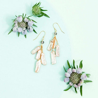 Blush stick pearl earrings with hanging tiers of blush pink freshwater pearls and smoky quartz accents on 14k gold plated sterling silver French hooks