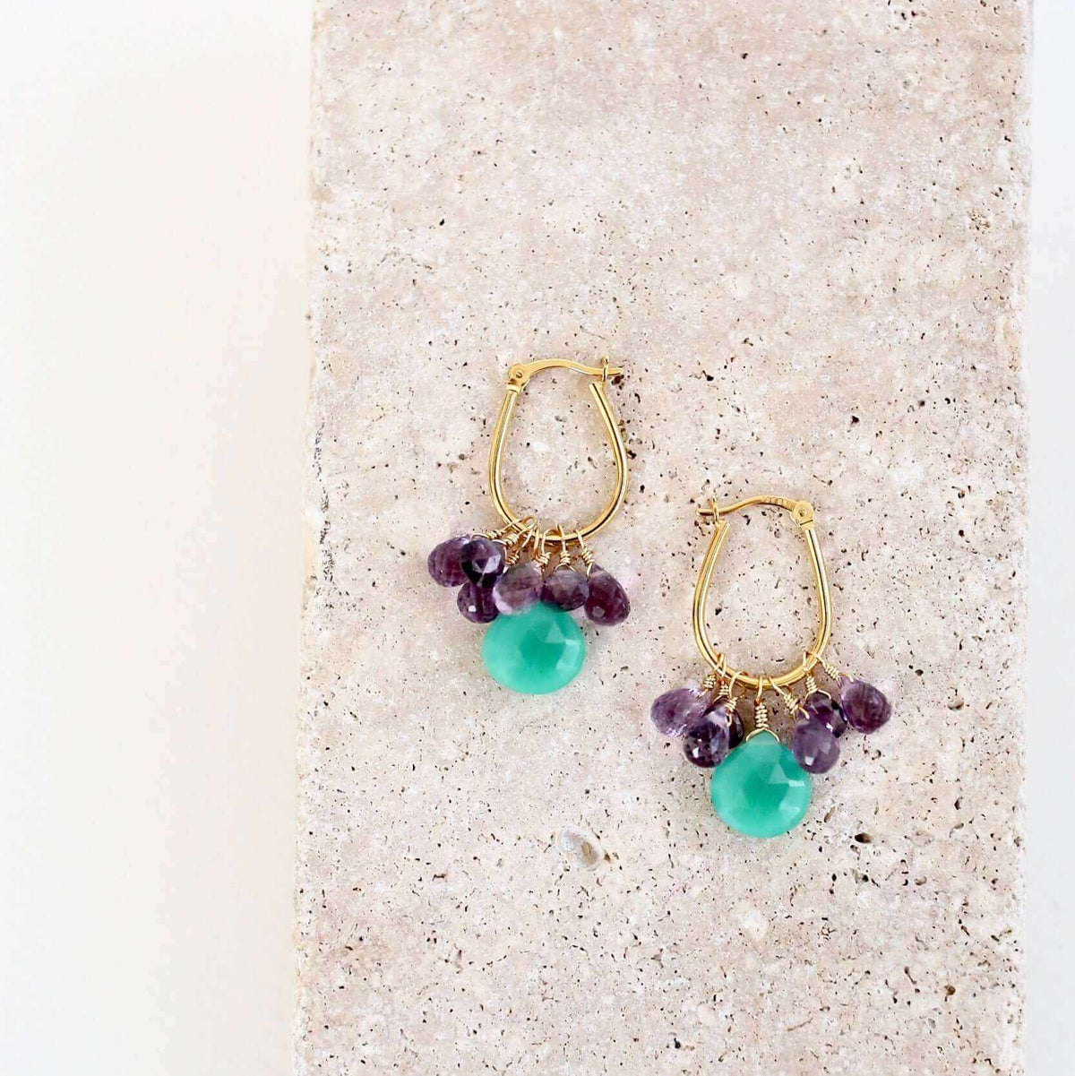 Chrysoprase & Amethyst Gold EarringsWe loved the bright sea green color of chrysoprase gemstones the minute we set eyes on them. Paired with sparkling amethyst, and so lightweight you'll love wearing tEarringsPARKEN JEWELRYVettedArcChrysoprase & Amethyst