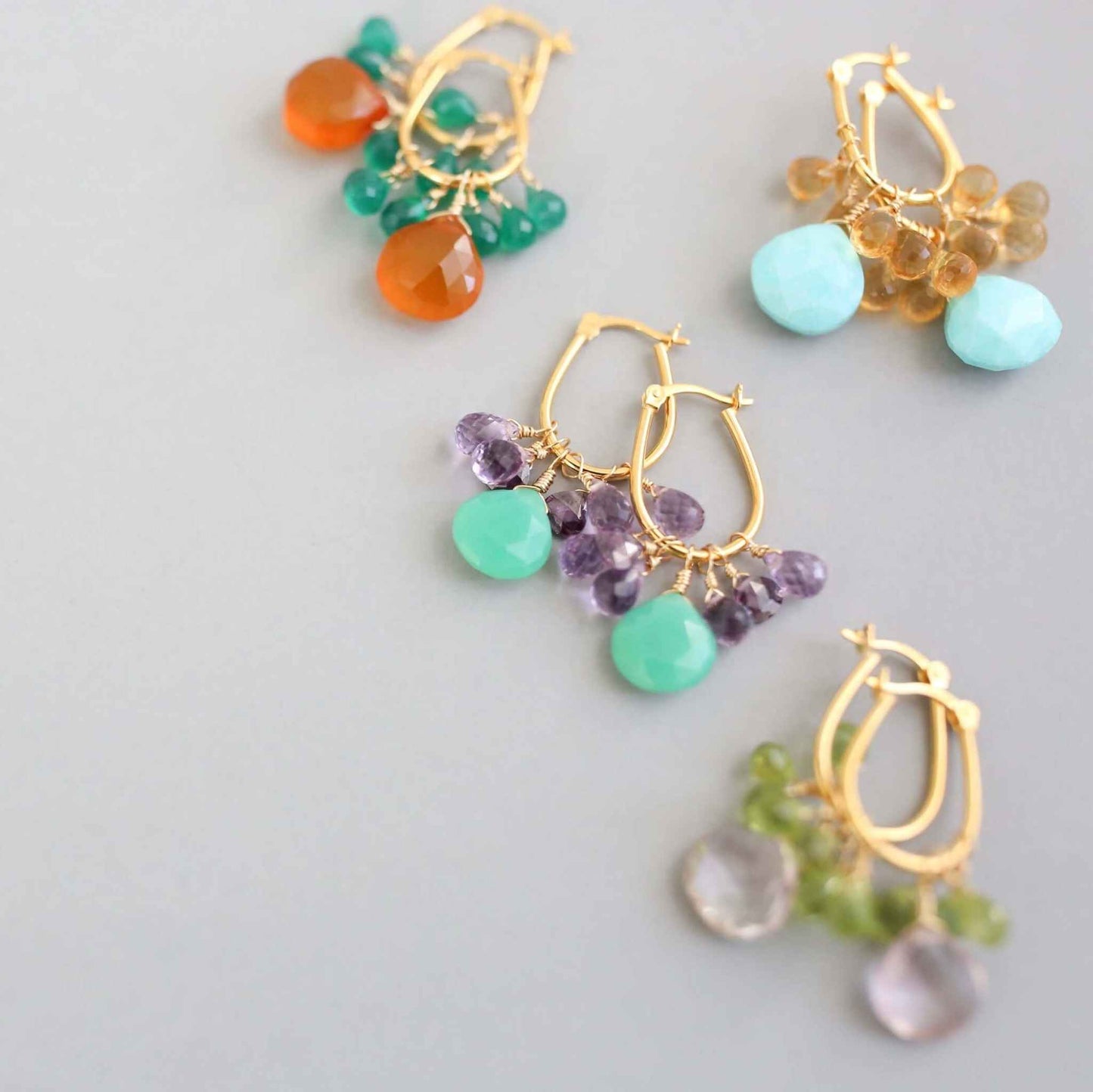 Chrysoprase & Amethyst Gold EarringsWe loved the bright sea green color of chrysoprase gemstones the minute we set eyes on them. Paired with sparkling amethyst, and so lightweight you'll love wearing tEarringsPARKEN JEWELRYVettedArcChrysoprase & Amethyst