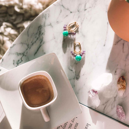 Chrysoprase & Amethyst Gold EarringsWe loved the bright sea green color of chrysoprase gemstones the minute we set eyes on them. Paired with sparkling amethyst, and so lightweight you'll love wearing tEarringsPARKEN JEWELRYVettedArcChrysoprase & Amethyst