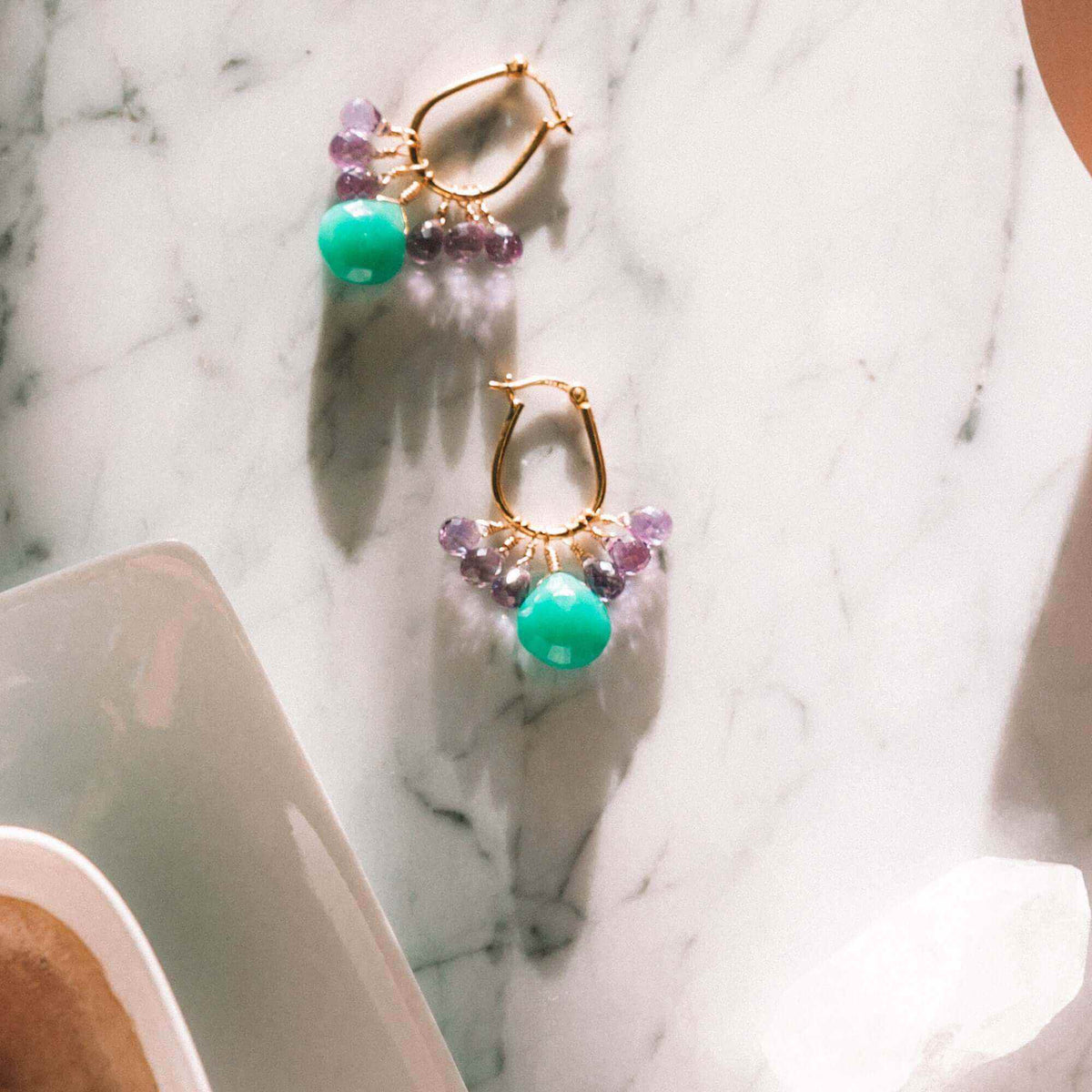 Chrysoprase & Amethyst Gold EarringsWe loved the bright sea green color of chrysoprase gemstones the minute we set eyes on them. Paired with sparkling amethyst, and so lightweight you'll love wearing tEarringsPARKEN JEWELRYVettedArcChrysoprase & Amethyst