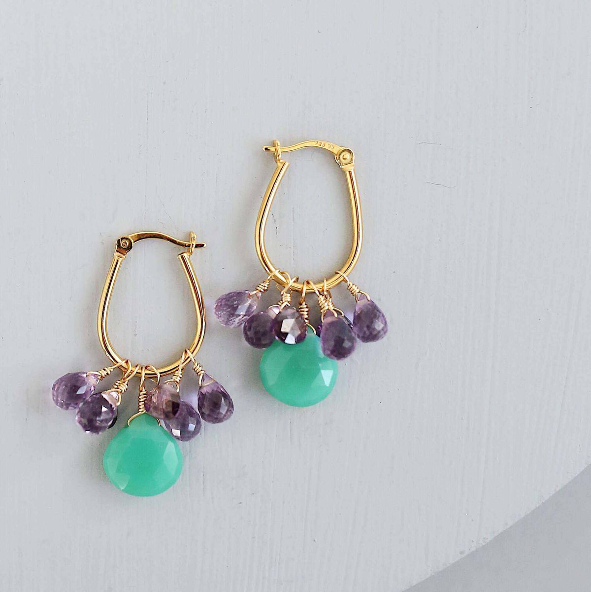 Chrysoprase & Amethyst Gold EarringsWe loved the bright sea green color of chrysoprase gemstones the minute we set eyes on them. Paired with sparkling amethyst, and so lightweight you'll love wearing tEarringsPARKEN JEWELRYVettedArcChrysoprase & Amethyst
