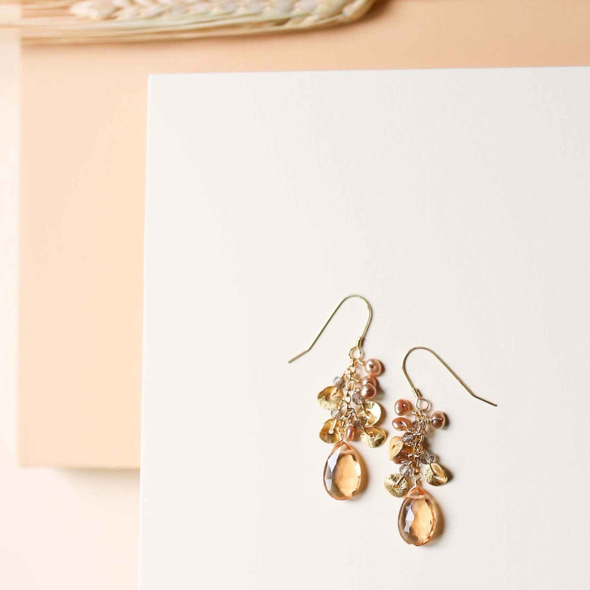 Citrine Aurora Earrings with cascading citrine gemstones, pearls, and 14k gold plated sterling silver hooks