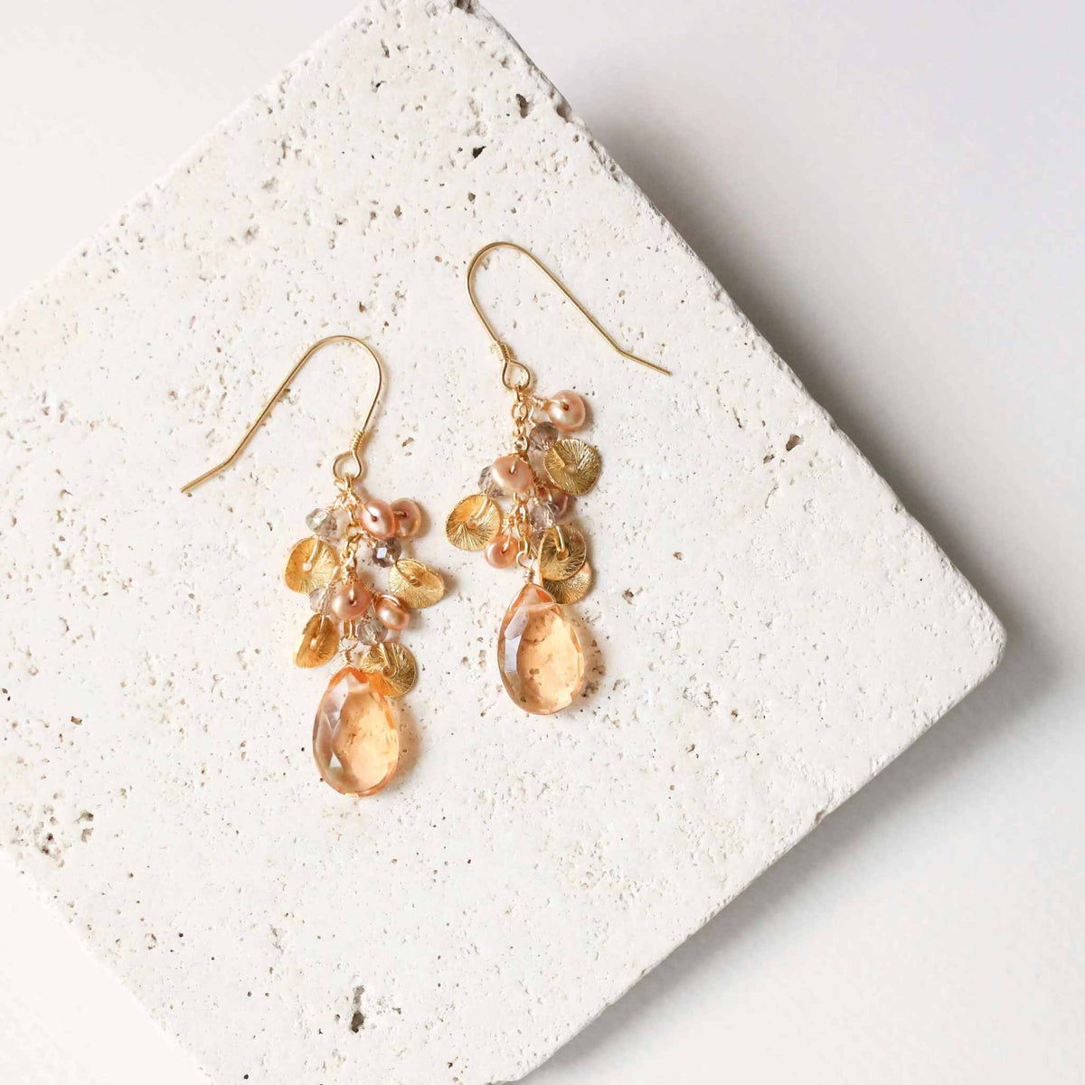 Citrine Aurora Earrings with cascading citrine gemstones, pearls, and gold accents on French hooks