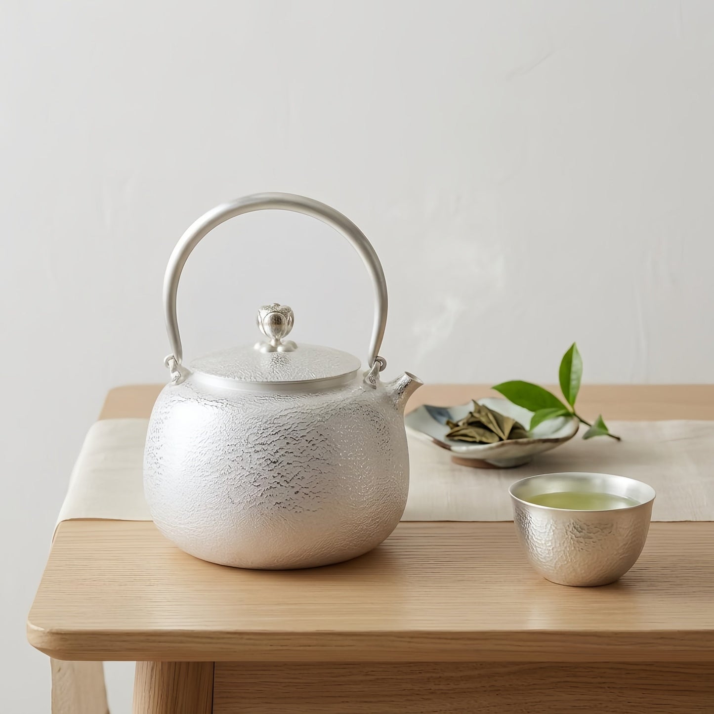 Pure 999 Fine Silver Handcrafted Fine Silver Teapot with Hammered Texture and Elegant Arched Handle - Handicraft