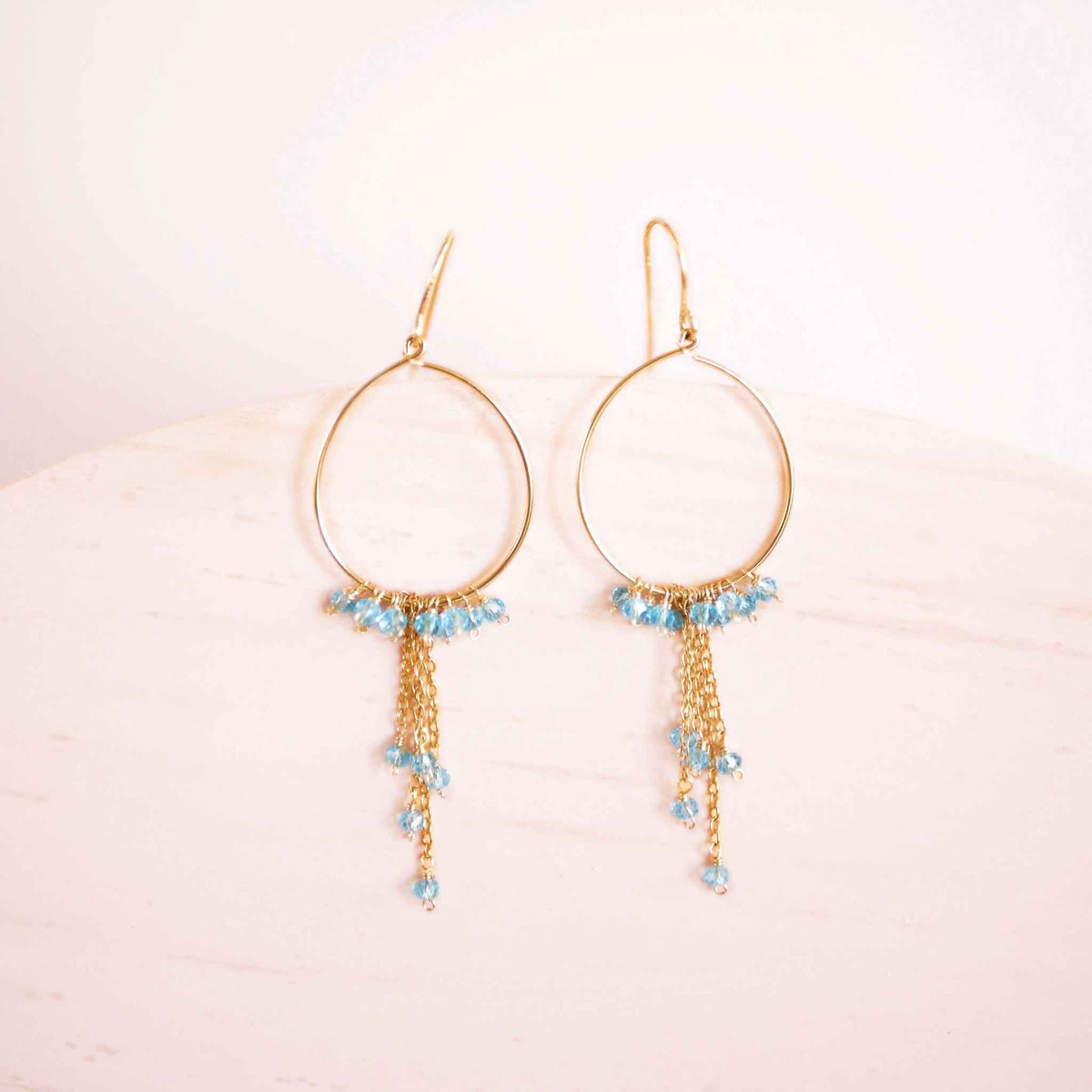 Garnet Mini Swing Hoop Earrings with delicate chains, 14k gold plated sterling silver, and garnet gemstones