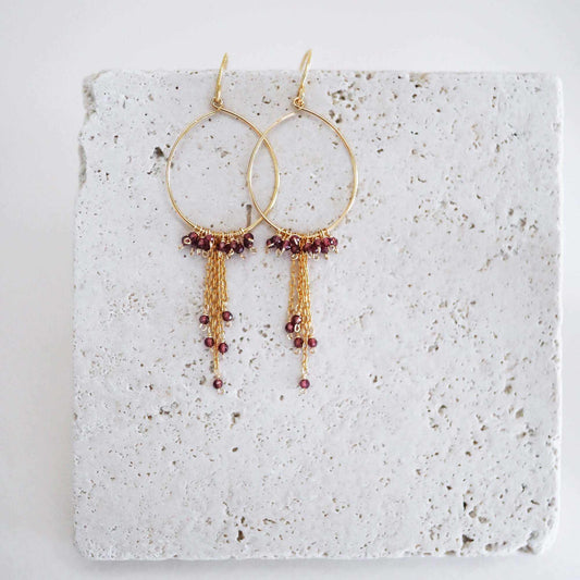 Garnet Mini Swing Hoop Earrings with delicate chains, 14k gold plated sterling silver, and garnet gemstones