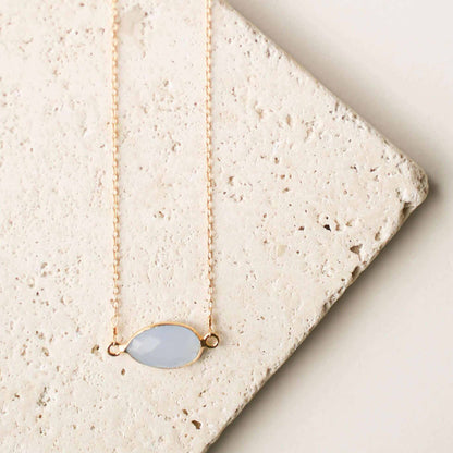 Minimalist gold and silver gemstone necklaces with bezel set stones for layering