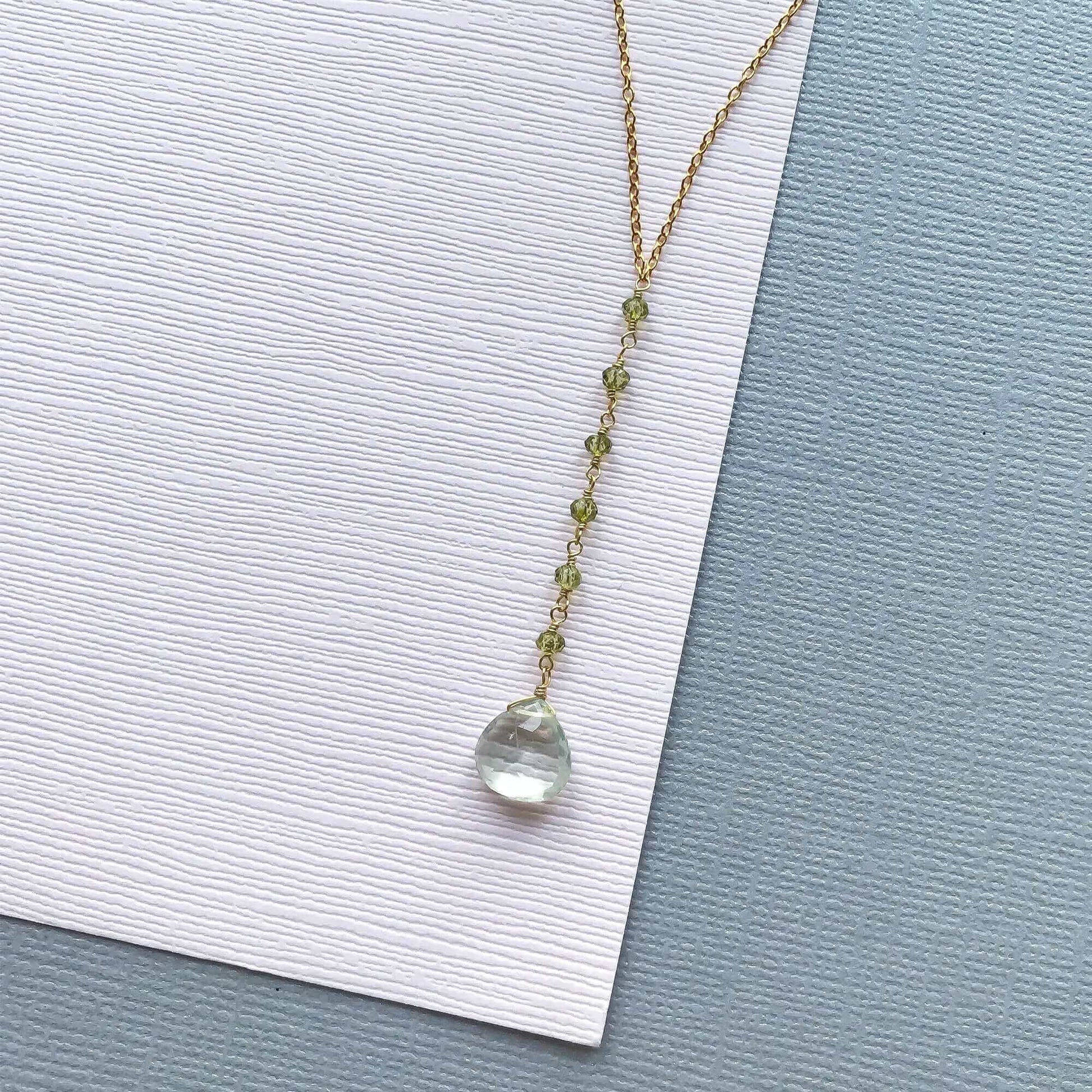 Green Amethyst Mini Yoga PendantYoga  pendant necklace with a green amethyst (a.k.a. prasiolite) gemstone and peridot accent stones- 18-20" long with a 2" extender chain- Pendant drop is 2" long- 1NecklacesPARKEN JEWELRYVettedArcGreen Amethyst Mini Yoga Pendant